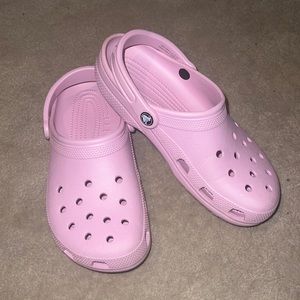 Light pink Crocs. Size 9 women’s. Some signs of wear as shown on bottom.